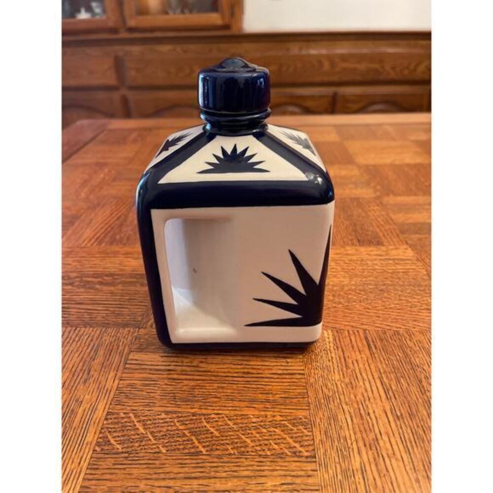 Handmade hand painted tequila bottle from Mexico